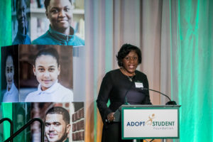 Principal Nampeera Lugira speaks at the 2019 Adopt-A-Student Foundation Dinner