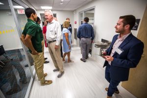 Students lead guests on the first tours of the newly-opened Applied Learning Center at Cathedral High School