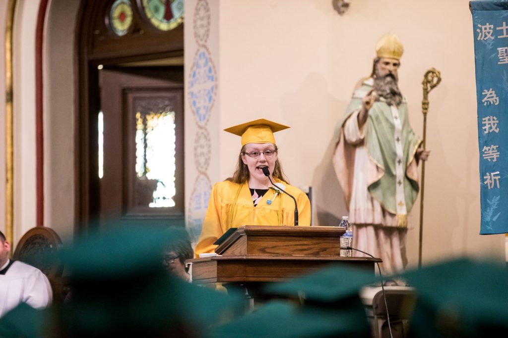 Valedictorian Amberose McDonald addresses her fellow graduates