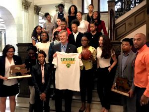 Massachusetts Governor Charlie Baker with the Cathedral High School girls basketball team state champions