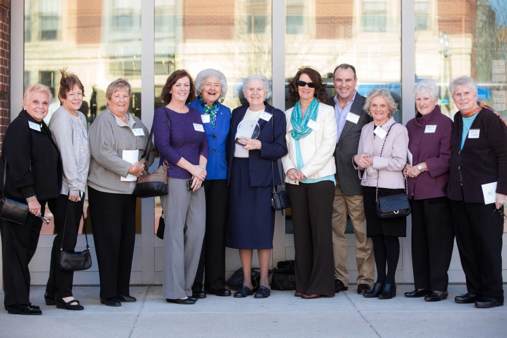Sr. Margaret Tuley, DC '53 stands with friends and family after receiving the 2015 St. Joseph the Worker Alumni Award at Cathedral High School on April 11