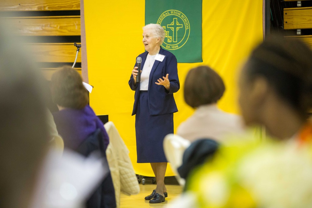 Award recipient Sister Margaret Tuley, of the Daughters of Charity, speaks to fellow Cathedral High School alumni and guests at the St. Joseph the Worker Alumni Awards ceremony on April 11