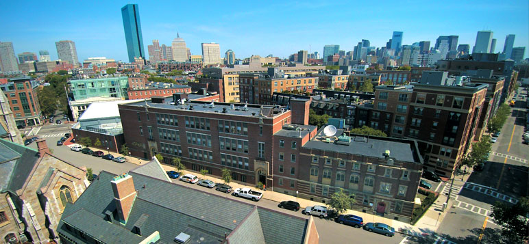Aerial view of Cathedral High School and the Boston City Skyline